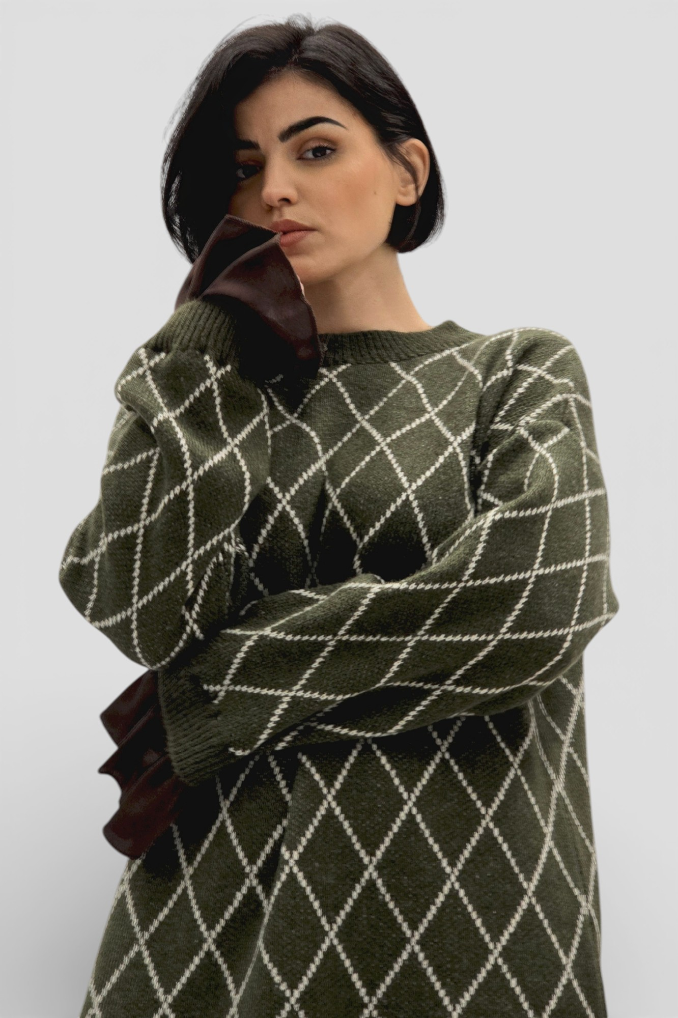 Zelena pletena haljina Cristal s dijamantnim uzorkom i satenskim rub s volanom